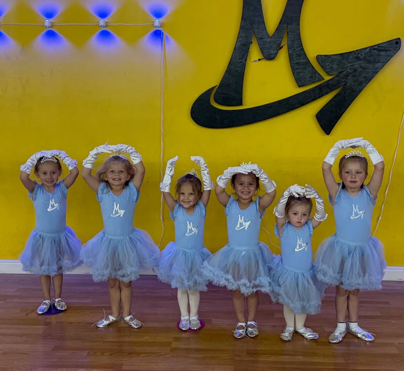 Princess Ballet dancers in pale blue tutus and tiaras at the studio